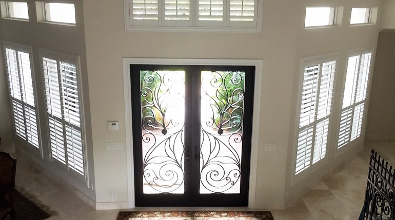 Houston foyer with glass doors and indoor shutters